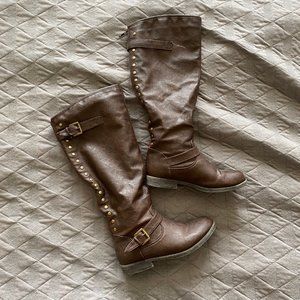 Brown riding boots with red zipper + bronze studs